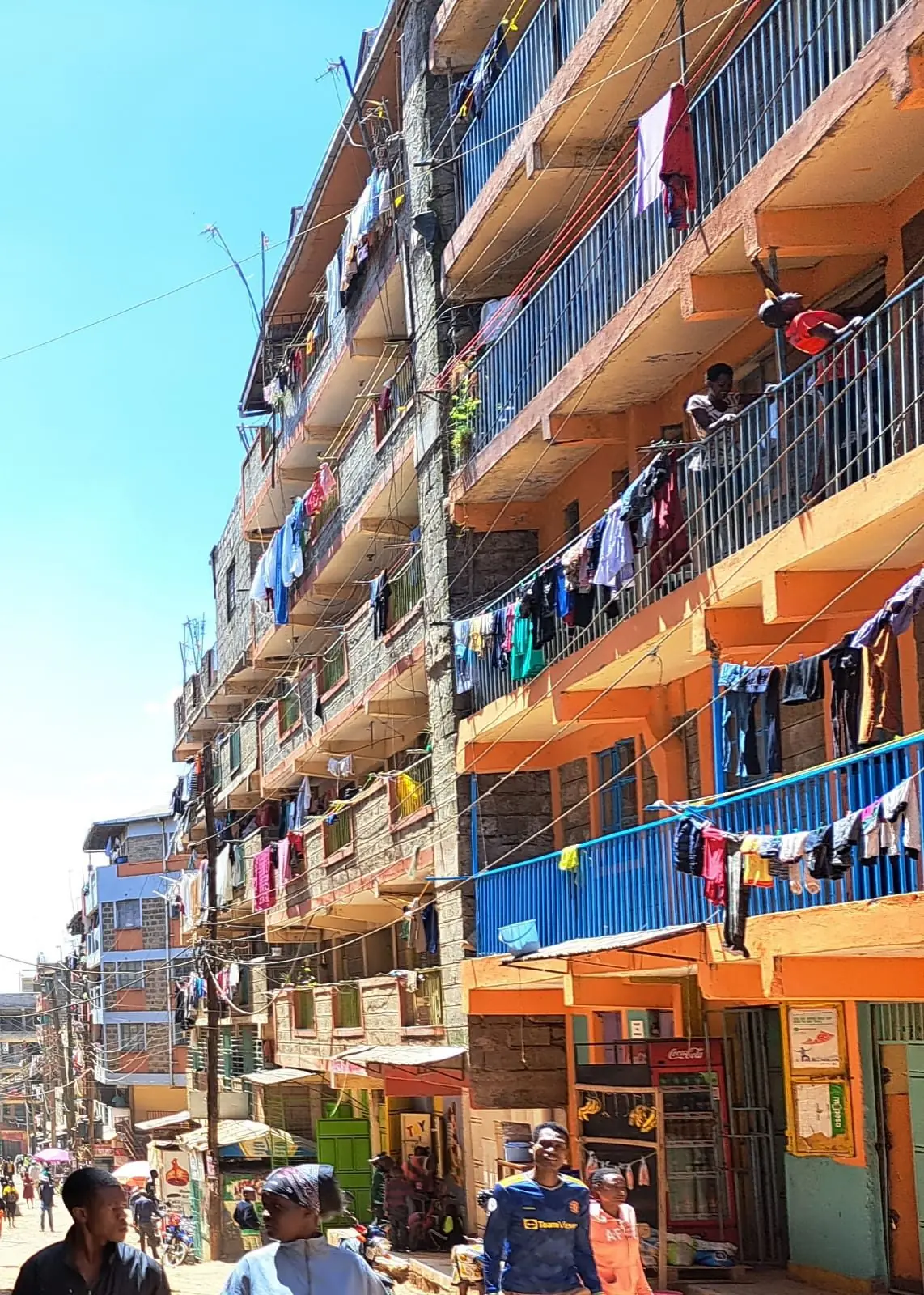 Tall residential blocks with balconies in a Nairobi neighbourhood