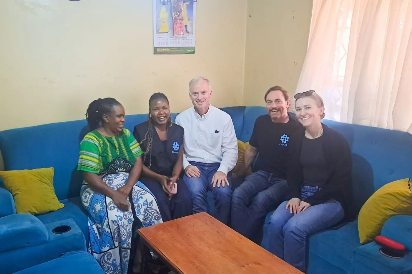 Inside a customer's home with the Vernonburg Group and Connect One Billion team.