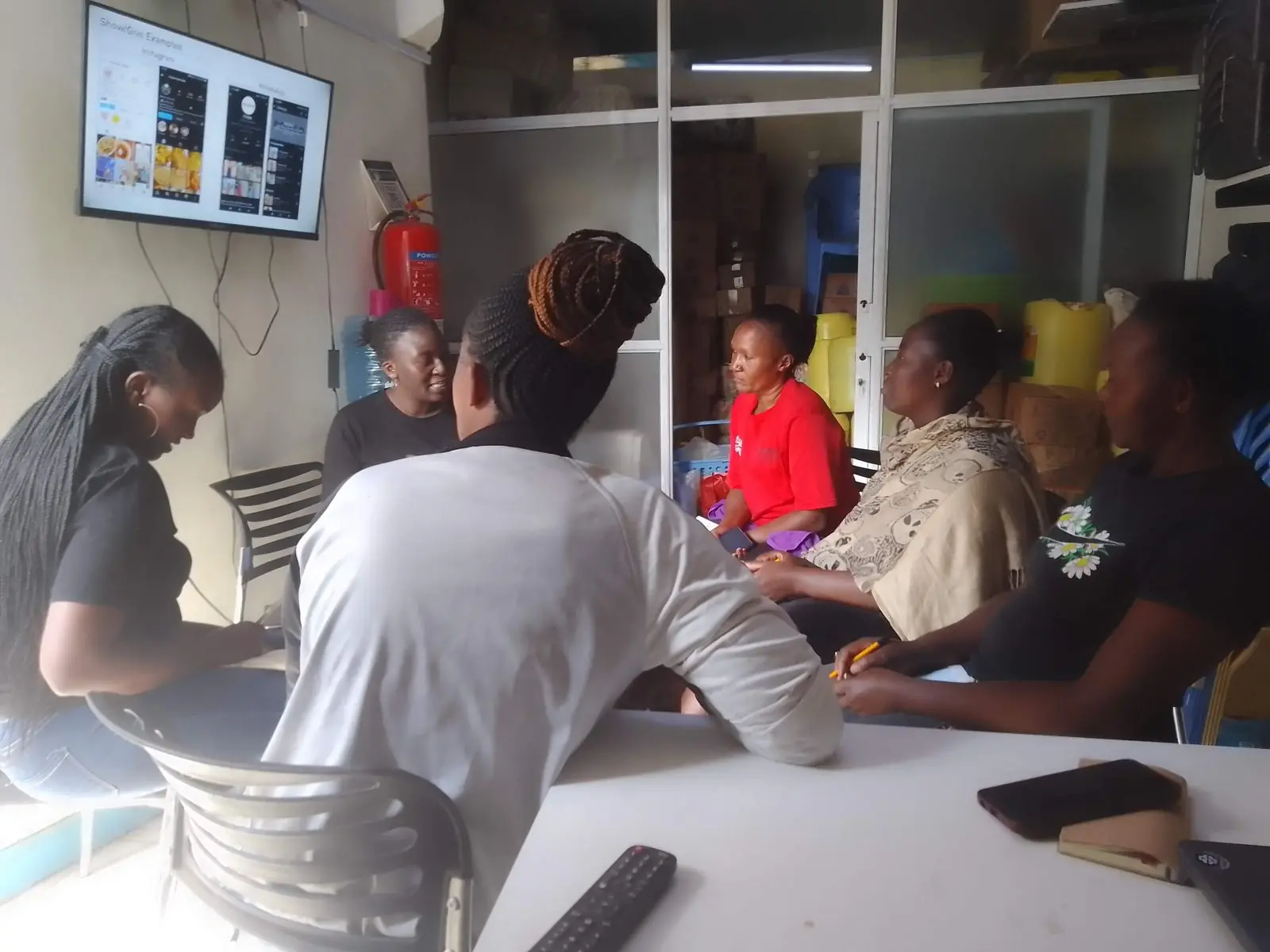 A group session watching the konnekt Media portal on a TV screen
